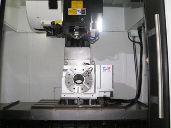 Four axis CNC machining center